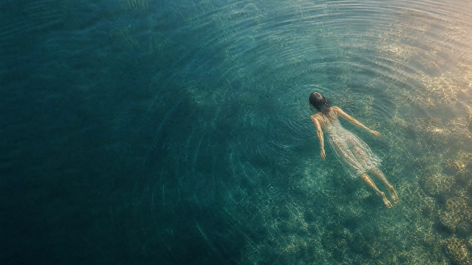 Calm water surface with gentle ripples